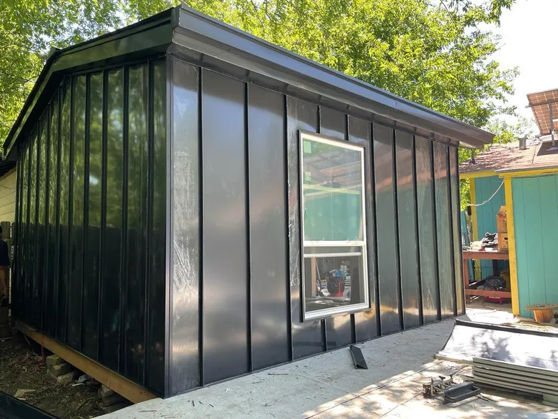 Black standing seam metal wall panels for Roof Inspection in Affton