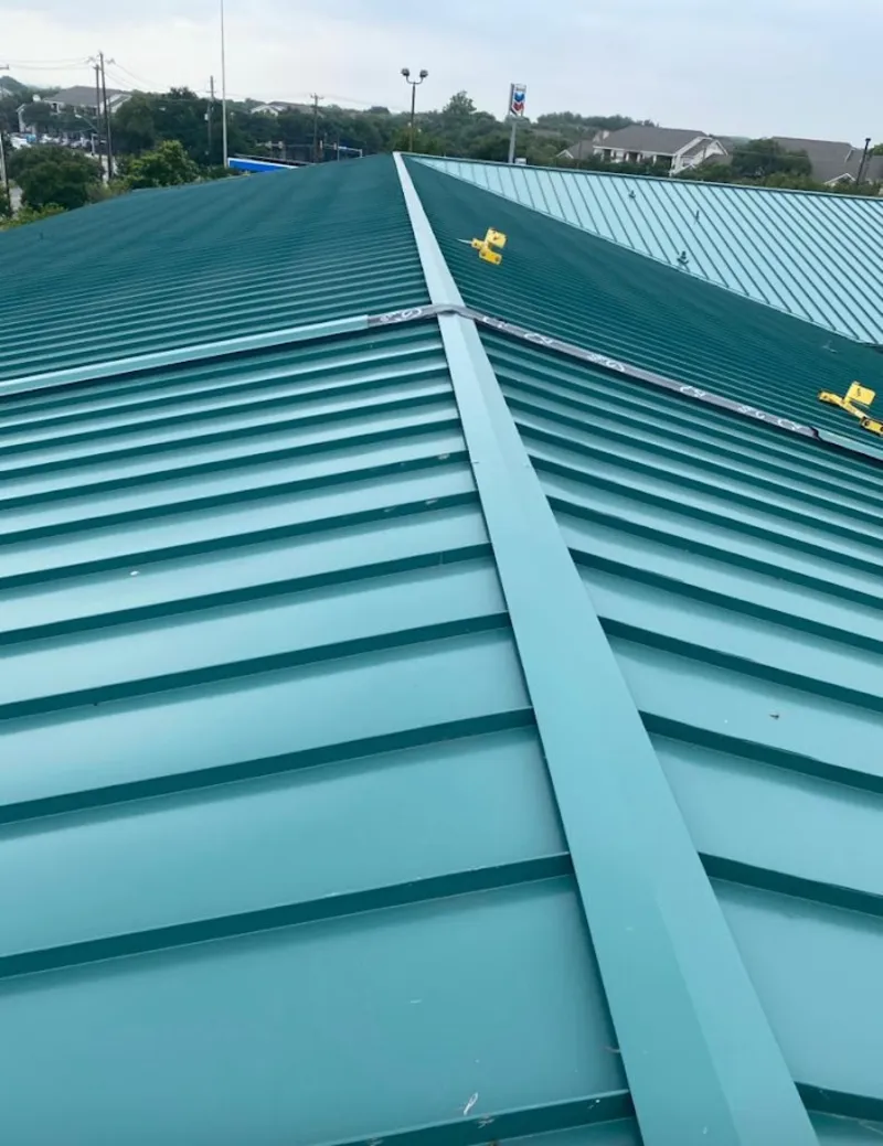 Green commercial metal roof ridge and valley for Metal Roof Repair in Affton